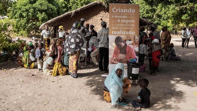 Residents gather to receive medical care to address early Motherhood and child marriage. Around half of Mozambique’s women -- 48.2% -- marry before they turn 18, according to UN children’s agency UNICEF. Of girls aged between 15 and 19, 46.4% are either pregnant or have already become mothers. (Gianluigi Guercia / AFP) Residents gather to receive medical care to address early Motherhood and child marriage. Around half of Mozambique’s women -- 48.2% -- marry before they turn 18, according to UN children’s agency UNICEF. Of girls aged between 15 and 19, 46.4% are either pregnant or have already become mothers. (Gianluigi Guercia / AFP)