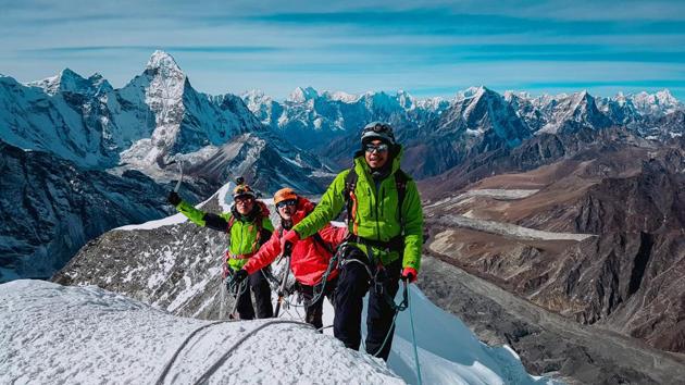 Aung Khaing Myint (R), Zaw Zin Khine (C), and Pyae Phyo Aung (L) during their ascent of Ama Dablam mountain in Nepal. “If we complete this, we can be proud Myanmar citizens,” Zaw Zin Khine said. He also hopes they will inspire more climbers in a country that only boasts a few dozen enthusiasts. “We plan to plant the nation’s flag with our own hands at the summit.” (Hkakabo Razi Expedition 2018 / AFP) Aung Khaing Myint (R), Zaw Zin Khine (C), and Pyae Phyo Aung (L) during their ascent of Ama Dablam mountain in Nepal. “If we complete this, we can be proud Myanmar citizens,” Zaw Zin Khine said. He also hopes they will inspire more climbers in a country that only boasts a few dozen enthusiasts. “We plan to plant the nation’s flag with our own hands at the summit.” (Hkakabo Razi Expedition 2018 / AFP)