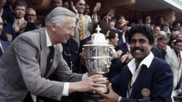 Kapil Dev, receives the Prudential World Cup Trophy from the Chairman of Prudential Assurance, Lord Carr of Hadley, after India's victory over the West Indies in the World Cup Final at Lord's cricket ground in London, 25th June 1983.(Getty Images)