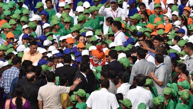 The Prime Minister meets schoolchildren after his address. Unveiling the Ayushmann Bharat scheme, Modi said that Pradhan Mantri Jan Arogya Abhiyaan will be launched on 25th September this year. It is high time we ensure that the poor of India get access to good quality and affordable healthcare. Healthcare initiatives of the Government of India will have a positive impact on 50 crore Indians. (Raj k Raj / HT Photo) The Prime Minister meets schoolchildren after his address. Unveiling the Ayushmann Bharat scheme, Modi said that Pradhan Mantri Jan Arogya Abhiyaan will be launched on 25th September this year. It is high time we ensure that the poor of India get access to good quality and affordable healthcare. Healthcare initiatives of the Government of India will have a positive impact on 50 crore Indians. (Raj k Raj / HT Photo)