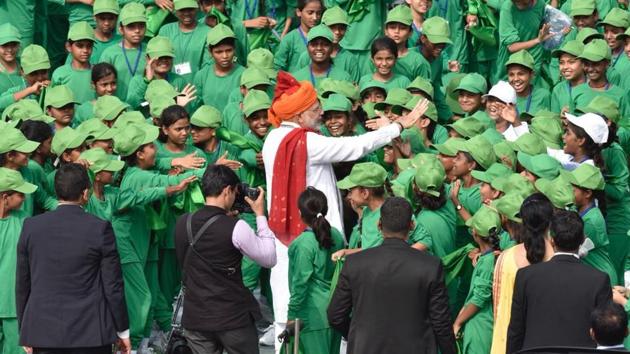 Prime Minister Narendra Modi greets children after his Independence Day speech at Red Fort, in New Delhi. (Raj K Raj/HT Photo) Prime Minister Narendra Modi greets children after his Independence Day speech at Red Fort, in New Delhi. (Raj K Raj/HT Photo)