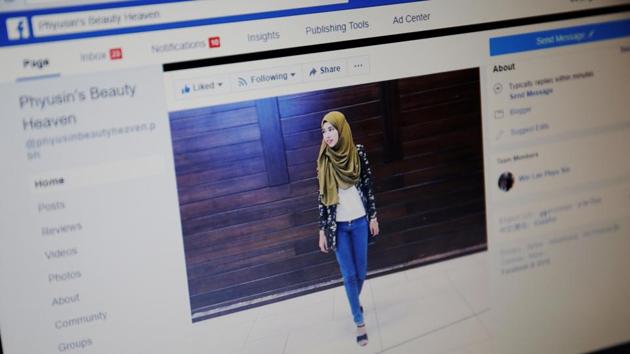 Win Lae Phyu Sin’s effort to impart a cool, chic vibe to the image of Myanmar Muslims, with stylish clothes that match her hijabs, elaborate mascara, and eyeshadow layered in bold colors, has drawn admirers. She has 6,000 followers on Facebook and 600 students have attended more than 150 classes on the use of cosmetics run in a makeshift studio. (Ann Wang / REUTERS) 