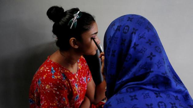 For some of Win Lae Phyu Sin’s students, her tutorials are not merely about applying eyeshadow and highlighter, but also about building confidence and pride in an identity constantly questioned by Buddhist fellow citizens. “I saw her applying make-up while wearing the hijab and it’s amazingly beautiful,” said Hay Mann Aung, 20. (Ann Wang / REUTERS) 