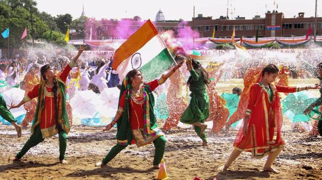 Schoolchildren perform during Independence Day celebrations at Mini Stadium in Jammu. (PTI)