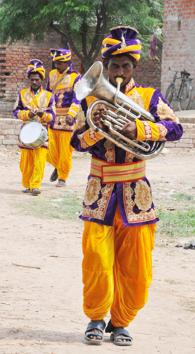 ‘Young couples today want instrumental music and soothing tunes at their weddings, which we can’t play,’ says bandmaster Gurucharan Lal Sahu. This means there is little work and incomes are plummeting for the village’s 1,200 musicians.(Dheeraj Dhawan / HT Photo)