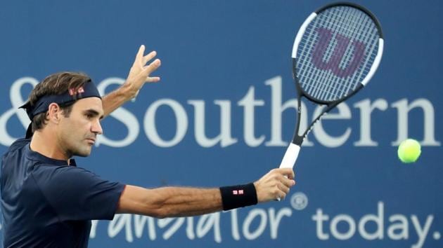 Roger Federer of Switzerland returns a shot to Peter Gojowczyk of Germany during Day 4 of the Western and Southern Open at the Lindner Family Tennis Center on August 14, 2018 in Mason, Ohio.(AFP)