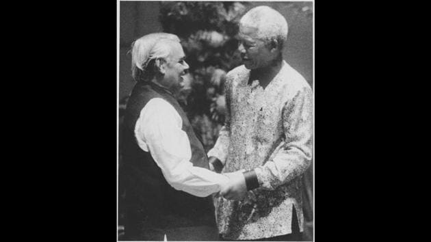 Atal Bihari Vajpayee being received by Nelson Mandela on his arrival in Durban to attend the inauguration of the 12th NAM Summit on September 2, 1998. (HT Archive)