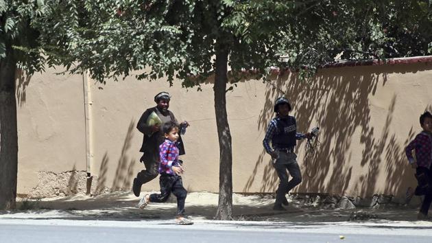Security forces at the site of the gunbattle. (AP) Security forces at the site of the gunbattle. (AP)