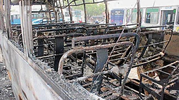 A bus torched during a flare-up after a Quran sacrilege incident at Malerkotla in 2016 (HT File) A bus torched during a flare-up after a Quran sacrilege incident at Malerkotla in 2016 (HT File)