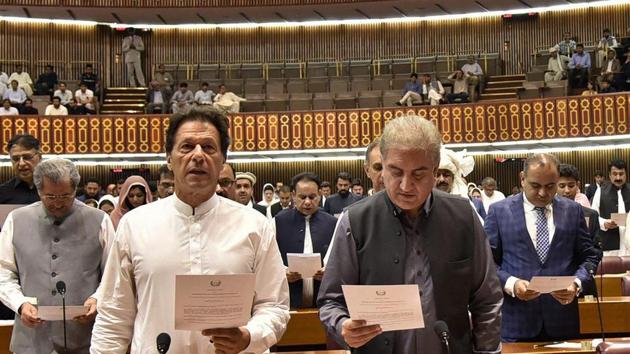 Newly elected parliamentarian Imran Khan, left, takes the oath of office with Shah Mehmood Qureshi, in Islamabad, Pakistan. (AP Photo) Newly elected parliamentarian Imran Khan, left, takes the oath of office with Shah Mehmood Qureshi, in Islamabad, Pakistan. (AP Photo)