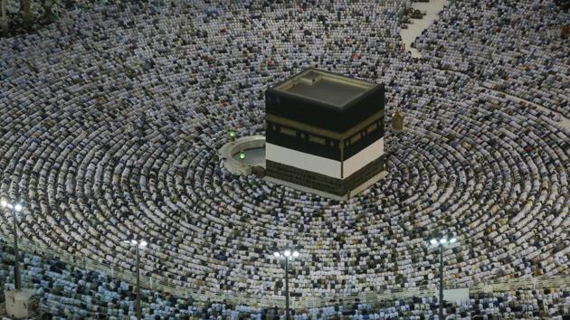 Muslim pilgrims pray at the Grand Mosque, ahead of the annual Hajj pilgrimage in the Muslim holy city of Mecca, Saudi Arabia. The annual Islamic pilgrimage draws millions of visitors each year, making it the largest yearly gathering of people in the world. (Dar Yasin / AP) Muslim pilgrims pray at the Grand Mosque, ahead of the annual Hajj pilgrimage in the Muslim holy city of Mecca, Saudi Arabia. The annual Islamic pilgrimage draws millions of visitors each year, making it the largest yearly gathering of people in the world. (Dar Yasin / AP)