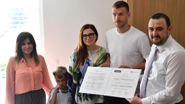 Edin Dzeko (2ndR), a Bosnian footballer who plays for Serie A Club Roma, recently signed up to fund one of the apartments for three years. “All of us who have children know that they are the most precious to us,” he told a news conference at the Parents’ House. “I want to show these children and their parents that they are not alone.” (Elvis Barukcic / AFP) 