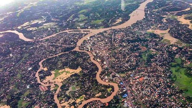 An aerial view of the floods in Aluva in Kerala on August 10, 2018. As the crisis deepens, many have open up their homes for flood survivors and many youngsters have turned volunteers to help the flood affected people. The Met office had forecast more rain for the next two days. (PTI) An aerial view of the floods in Aluva in Kerala on August 10, 2018. As the crisis deepens, many have open up their homes for flood survivors and many youngsters have turned volunteers to help the flood affected people. The Met office had forecast more rain for the next two days. (PTI)