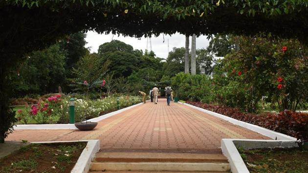 A view of the walkway through the gardens. The Residency garden at one time had about 3400 potted plants. Of these, the biggest collection was that of crotons followed by those of foliage plants, ferns and roses. This tradition is maintained even today. (Arijit Sen / HT Photo)