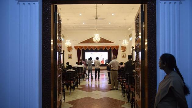 A group of media persons seen inside the Banquet hall. Classical 19th century bungalows were always single storeyed, though their height gave the impression of an upper floor. The Residency was also originally a single-storeyed building constructed in the British Colonial style which came to be known as the Residency style of architecture. (Arijit Sen / HT Photo)