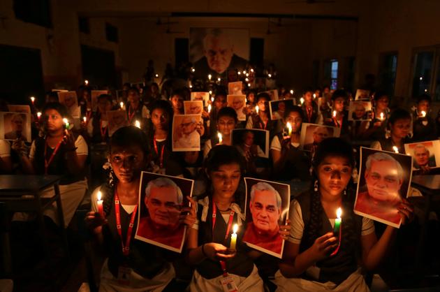 Schoolgirls hold candles and photographs of India's former prime minister Atal Bihari Vajpayee to pay him homage during a prayer ceremony inside a school in Chennai. (REUTERS) Schoolgirls hold candles and photographs of India's former prime minister Atal Bihari Vajpayee to pay him homage during a prayer ceremony inside a school in Chennai. (REUTERS)
