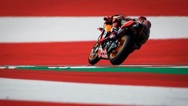 Repsol Honda Team’s Spanish rider Marc Marquez competes during the warm up session of the Austrian MotoGP Grand Prix at the Red Bull Ring in Spielberg, Austria. (Jure Makovec / AFP) Repsol Honda Team’s Spanish rider Marc Marquez competes during the warm up session of the Austrian MotoGP Grand Prix at the Red Bull Ring in Spielberg, Austria. (Jure Makovec / AFP)