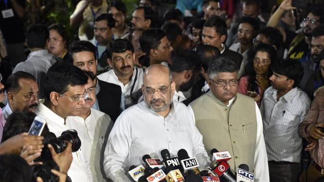 BJP President Amit Shah addresses the media after the convoy carrying the mortal remains of former prime minister Atal Bihari Vajpayee arrives at his Krishna Menon Marg residence, in New Delhi on Thursday, Aug 16, 2018. (PTI) BJP President Amit Shah addresses the media after the convoy carrying the mortal remains of former prime minister Atal Bihari Vajpayee arrives at his Krishna Menon Marg residence, in New Delhi on Thursday, Aug 16, 2018. (PTI)