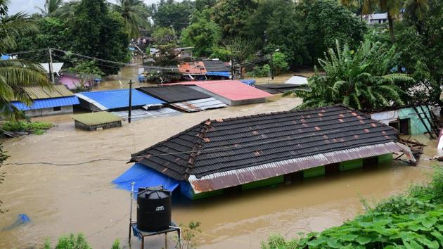 A view of houses seen submerged at Palakkad in Kerala, on August 09, 2018. Continuous rain, landslides and floods have claimed over 160 lives so far and more than 150,000 people are jostling for space in relief camps as their houses collapsed under heavy rainfall or were cut off by surging waters. (PTI Photo) A view of houses seen submerged at Palakkad in Kerala, on August 09, 2018. Continuous rain, landslides and floods have claimed over 160 lives so far and more than 150,000 people are jostling for space in relief camps as their houses collapsed under heavy rainfall or were cut off by surging waters. (PTI Photo)