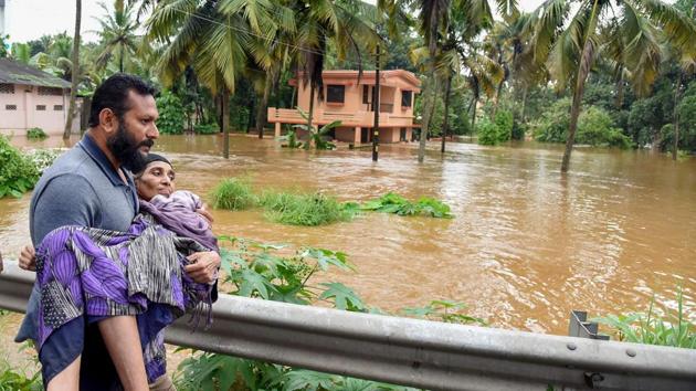 People being rescued from a flood-affected region following heavy monsoon rainfall, in Kochi on Thursday, Aug 16, 2018.(PTI Photo) People being rescued from a flood-affected region following heavy monsoon rainfall, in Kochi on Thursday, Aug 16, 2018.(PTI Photo)