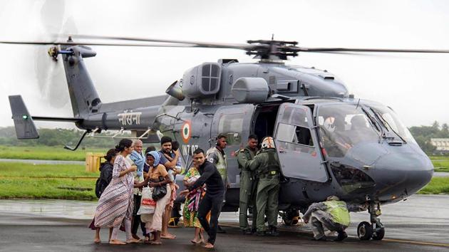 Air Force personnel carry out rescue operations at a flood-affected region following heavy monsoon rainfall, in Kochi on Thursday, Aug 16, 2018. (PTI) Air Force personnel carry out rescue operations at a flood-affected region following heavy monsoon rainfall, in Kochi on Thursday, Aug 16, 2018. (PTI)