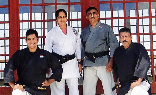 (From left) Neeraj Kulkarni, Sensei Sharmila Nadkarni, Sensei Salil Nadkarni and Shripad Mahajan at the Okinawa International Karate and Kubodo (weapon) tournament held in Okinawa, Japan. (HT PHOTO) (From left) Neeraj Kulkarni, Sensei Sharmila Nadkarni, Sensei Salil Nadkarni and Shripad Mahajan at the Okinawa International Karate and Kubodo (weapon) tournament held in Okinawa, Japan. (HT PHOTO)