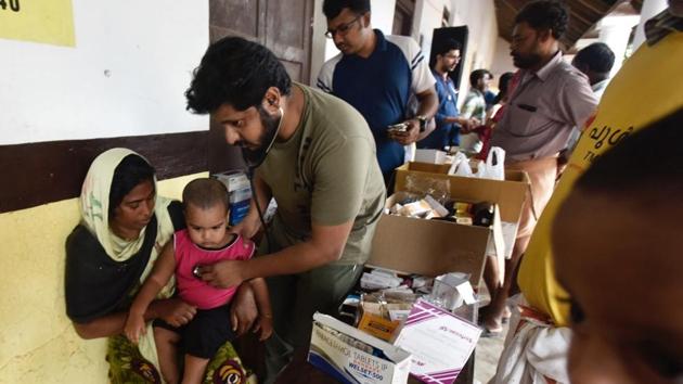 A child being treated at a relief camp in Pandalam, Kerala as the state reels under floods. (Raj K Raj/HT Photo)