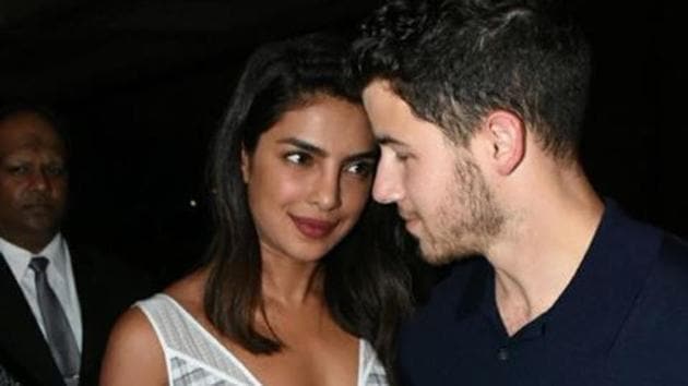 Nick Jonas and Priyanka Chopra at a dinner date with their families a day before their reported engagement party.(Viral Bhayani)