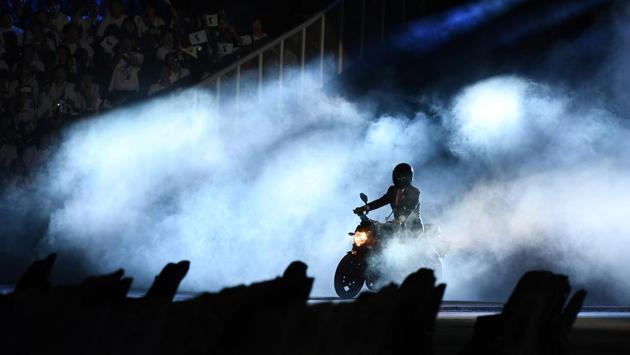 An actor impersonating Indonesian President Joko Widodo rides a motorbike during the opening ceremony of the 2018 Asian Games. (AFP) An actor impersonating Indonesian President Joko Widodo rides a motorbike during the opening ceremony of the 2018 Asian Games. (AFP)