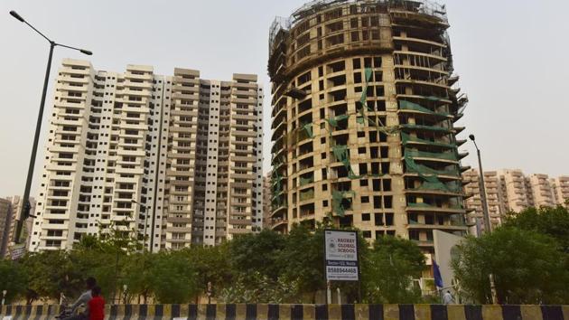 A view of under-construction Supertech building at sector 77, in Noida.(Virendra Singh Gosain/HT File Photo)