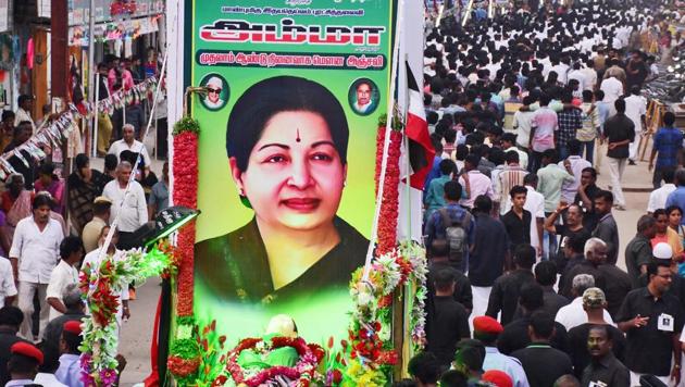 AIADMK cadres stage a 'silent rally' to observe the first death anniversary of J Jayalalithaa, at West Masi Street in Madurai.(PTI File Photo)