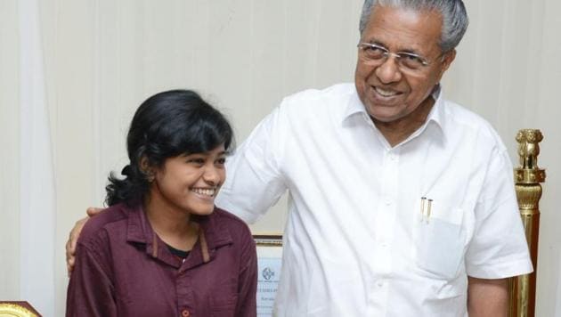 Kerala college student Hanan with chief minister Pinarayi Vijayan.(HT File Photo)