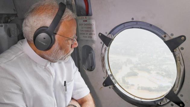 Prime Minister Narendra Modi conducts an aerial survey of flood-affected areas in Kerala on Saturday, August 18, 2018.(PTI)