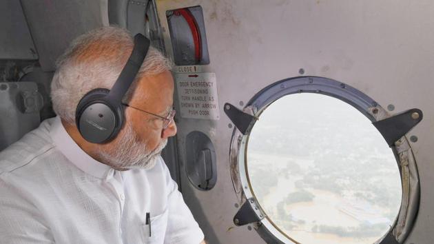 Prime Minister Narendra Modi conducts an aerial survey of flood-affected areas in Kerala on Saturday. (PTI Photo)
