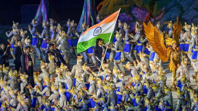 Star javelin thrower Neeraj Chopra bears the tricolour as he leads the Indian contingent. (PTI) Star javelin thrower Neeraj Chopra bears the tricolour as he leads the Indian contingent. (PTI)