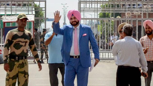 Punjab minister and former cricketer Navjot Singh Sidhu waves as he crosses the border to attend the swearing-in ceremony of Pakistan Prime Minister-elect Imran Khan, at Attari-Wagah border in Attari on August 17, 2018. (PTI) Punjab minister and former cricketer Navjot Singh Sidhu waves as he crosses the border to attend the swearing-in ceremony of Pakistan Prime Minister-elect Imran Khan, at Attari-Wagah border in Attari on August 17, 2018. (PTI)