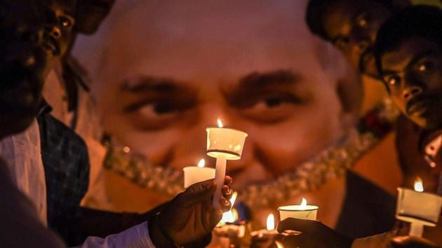 BJP members hold candles to pay tribute to former prime minister Atal Bihari Vajpayee, in Bengaluru on Friday, Aug 17, 2018. (PTI) BJP members hold candles to pay tribute to former prime minister Atal Bihari Vajpayee, in Bengaluru on Friday, Aug 17, 2018. (PTI)