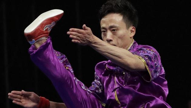 China's Peiyuan Sun perform during the Wushu men's Changquan games at the Asian Games in Jakarta.(AP)