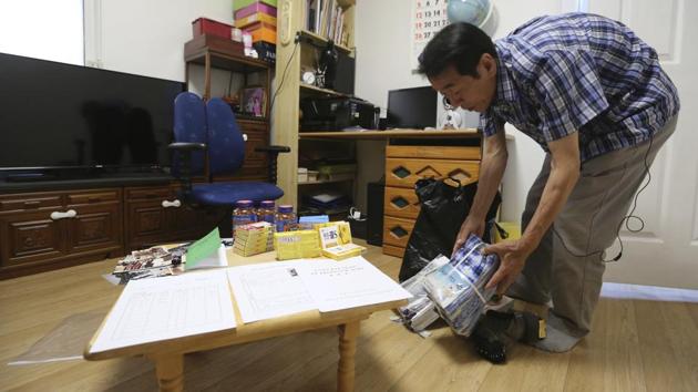 Lee Soo-nam arranges gifts for family members of his brother Ri Jong Song in North Korea. The families will be temporarily reunited in North Korea starting Monday after the two Koreas renewed exchanges this year following a standoff over Pyongyang’s nuclear and missile programmes. (Ahn Young-joon / AP) Lee Soo-nam arranges gifts for family members of his brother Ri Jong Song in North Korea. The families will be temporarily reunited in North Korea starting Monday after the two Koreas renewed exchanges this year following a standoff over Pyongyang’s nuclear and missile programmes. (Ahn Young-joon / AP)