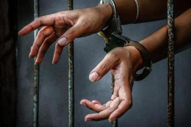 Prisoner in prison with handcuff. (Getty Images/iStockphoto) Prisoner in prison with handcuff. (Getty Images/iStockphoto)