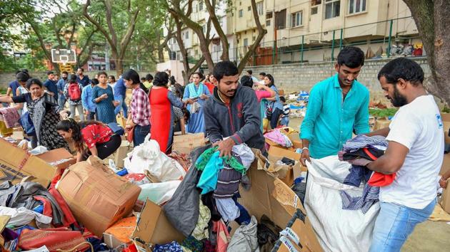 Volunteers segregate relief material to be sent to Kodagu area at Kodava Samaj, in Bengaluru.(PTI Photo) Volunteers segregate relief material to be sent to Kodagu area at Kodava Samaj, in Bengaluru.(PTI Photo)