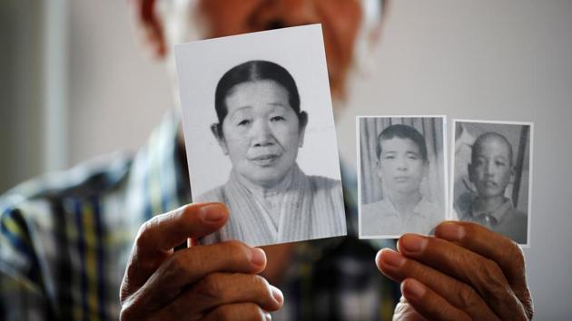 A man selected as a participant for a reunion shows pictures of his deceased mother and little brothers living in North Korea. South Korean family members arrived at the coastal border city of Sokcho on Sunday to be briefed by officials on the reunion and for a brief health check-up, before crossing the border on Monday. (Kim Hong-Ji / REUTERS) A man selected as a participant for a reunion shows pictures of his deceased mother and little brothers living in North Korea. South Korean family members arrived at the coastal border city of Sokcho on Sunday to be briefed by officials on the reunion and for a brief health check-up, before crossing the border on Monday. (Kim Hong-Ji / REUTERS)