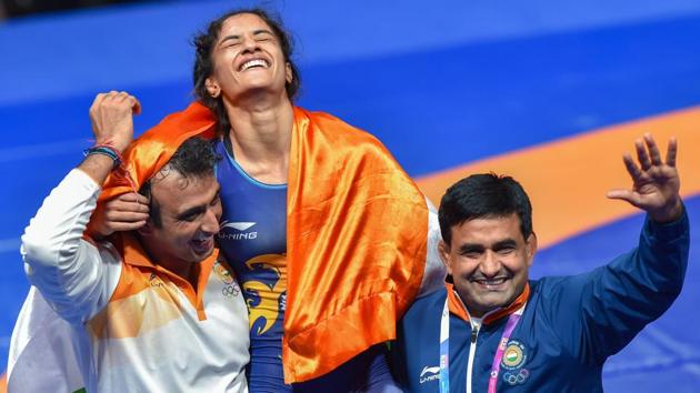 Jakarta: India's Vinesh Phogat celebrates after winning the Gold medal in women's freestyle 50 kg wrestling at the Asian Games 2018, in Jakarta. (PTI) Jakarta: India's Vinesh Phogat celebrates after winning the Gold medal in women's freestyle 50 kg wrestling at the Asian Games 2018, in Jakarta. (PTI)