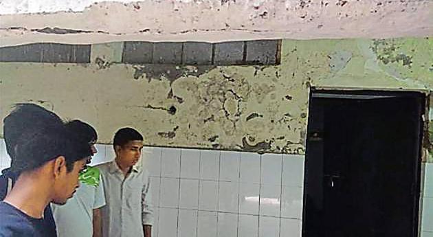 Portions of roof of the school for visually impaired boys in Kingsway Camp have now been temporarily patched up. (HT Photo) Portions of roof of the school for visually impaired boys in Kingsway Camp have now been temporarily patched up. (HT Photo)