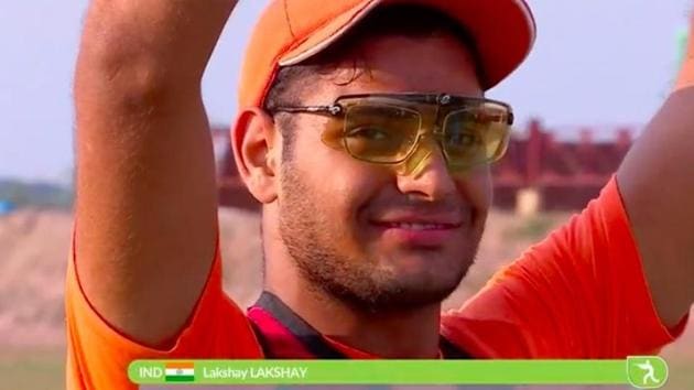 India’s Lakdhay reacts after winning a silver medal in the Men’s Trap shooting event at the 2018 Asian Games.(Twitter)