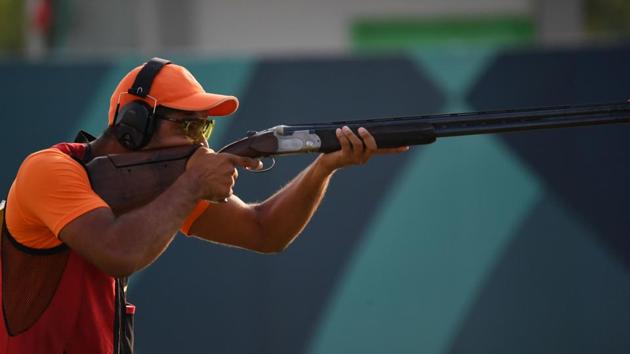 Lakshay of India competes in the men's trap shooting event at the 2018 Asian Games. (AFP) Lakshay of India competes in the men's trap shooting event at the 2018 Asian Games. (AFP)