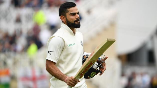 India's captain Virat Kohli leaves the pitch after getting out lbw for 103 runs during the third day of the third Test cricket match between England and India at Trent Bridge in Nottingham, central England on August 20, 2018.(AFP)