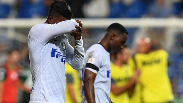 Inter Milan's Senegalese forward Keita Balde (L) reacts as he leaves the pitch at the end of the Italian Serie A football match Sassuolo vs Inter Milan at the Mapei Stadium in Reggio Emilia on August 19, 2018.(AFP)