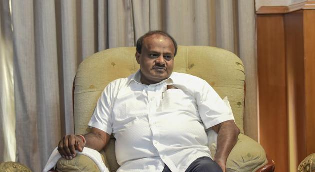 Karnataka chief minister HD Kumaraswamy cited available information to state that 845 houses had been completed destroyed, 743 partially wrecked, 143 km of roads washed away and 57 bridges damaged.(Burhaan Kinu/HT Photo)