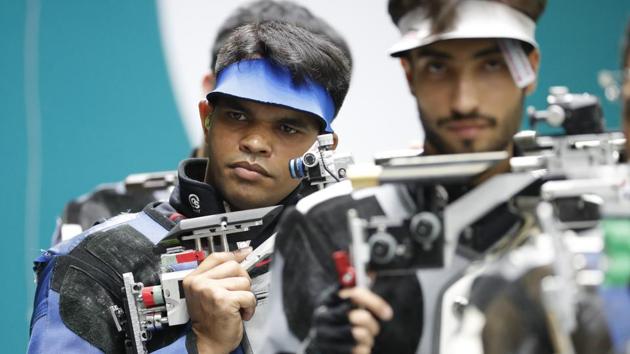 India's Deepak Kumar in action during the 10m air rifle men's final shooting event at the Asian Games 2018.(AP)